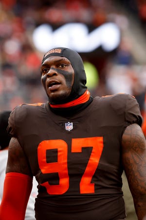 Cleveland Browns defensive tackle Perrion Winfrey (97) stands on the sideline against the Tampa Bay Buccaneers, Sunday, Nov. 27, 2022, in Cleveland.